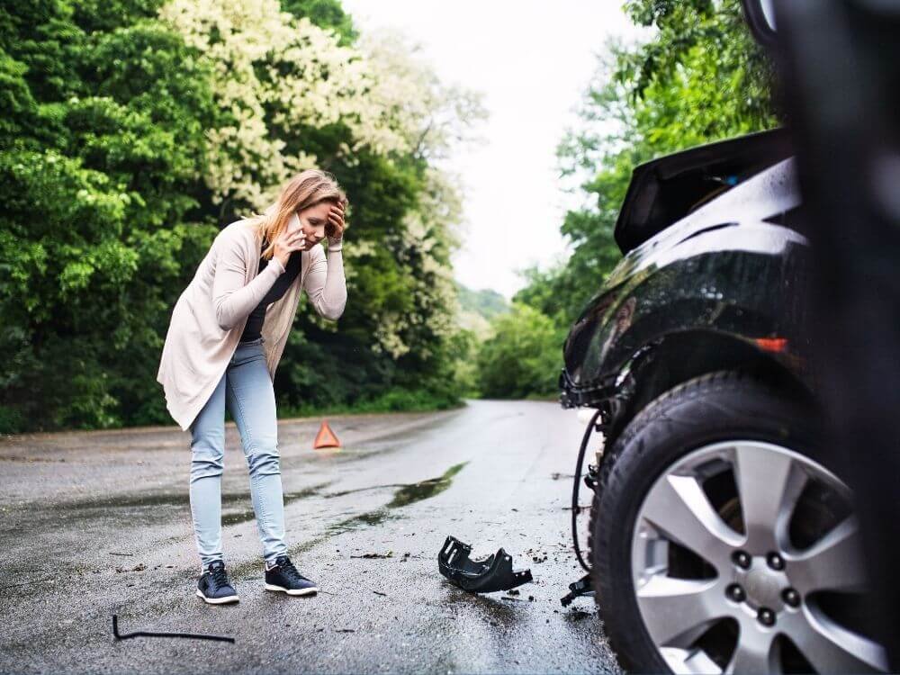 Emergency Loans - Young Woman in a Car Accident
