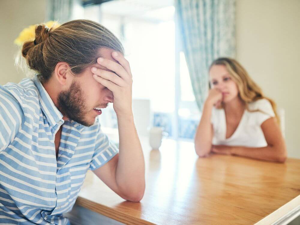 frustrated couple planning on getting a same day loan